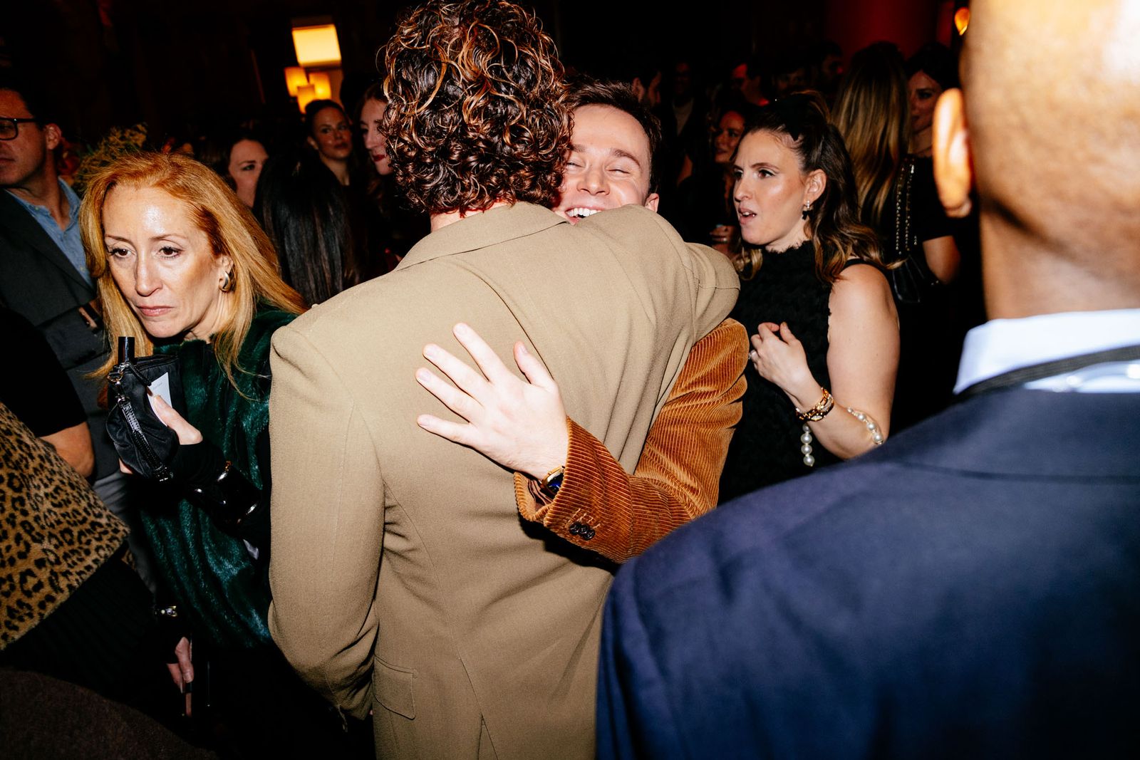 Image may contain Judee Sill Adult Person Hugging Wedding Face Head and Baby