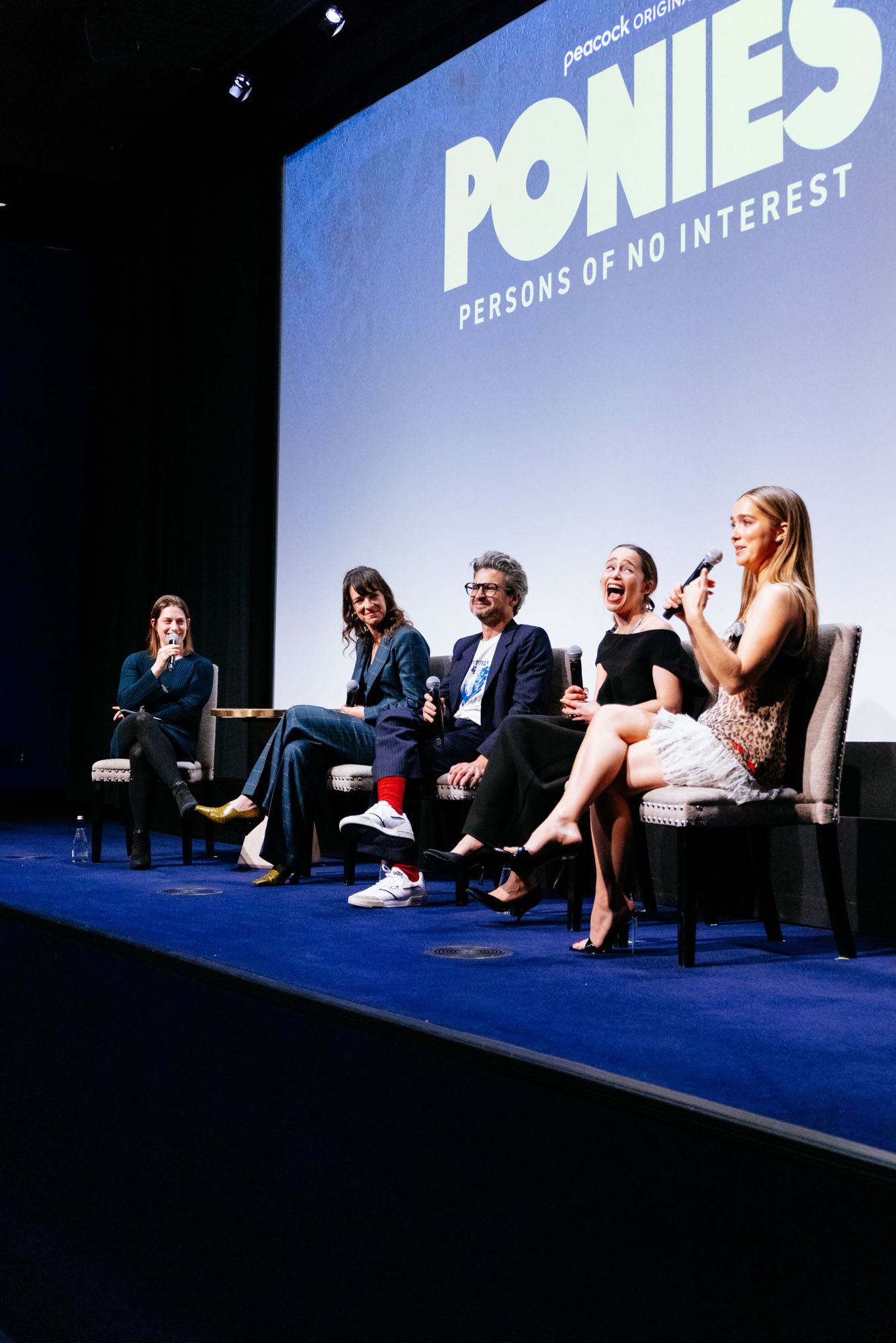 Image may contain Haley Lu Richardson Emilia Clarke Susanna Fogel Crowd Person People Adult Accessories and Glasses