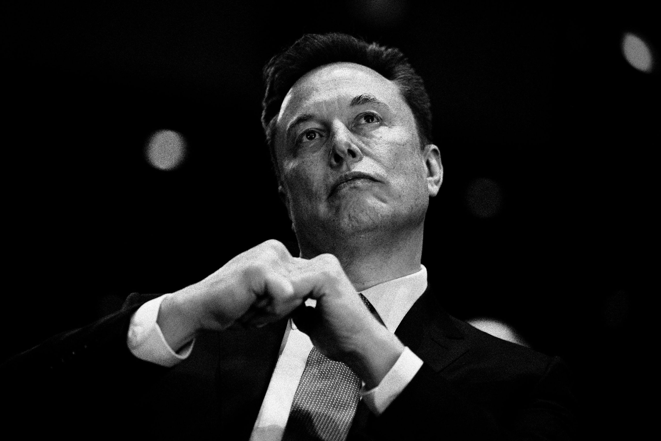 Image may contain Elon Musk Face Head Person Photography Portrait Body Part Finger Hand Neck and Adult
